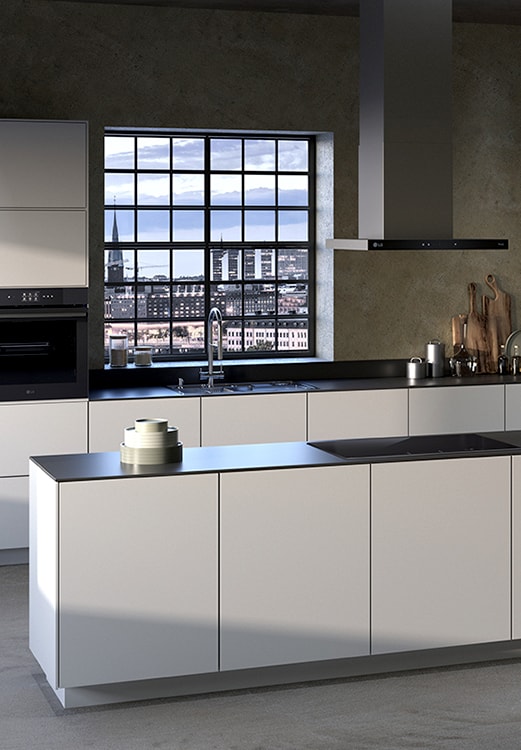 The kitchen interior with an LG built-in oven, hood, and induction cooktop installed.