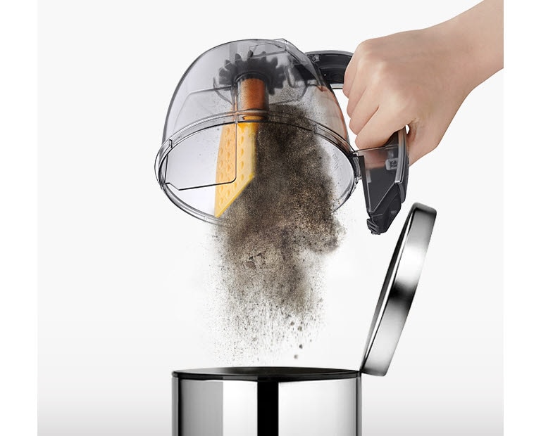 The Kompressor™ automatically compresses the dust in the dust bin, illustrating the user emptying the dust easily.
