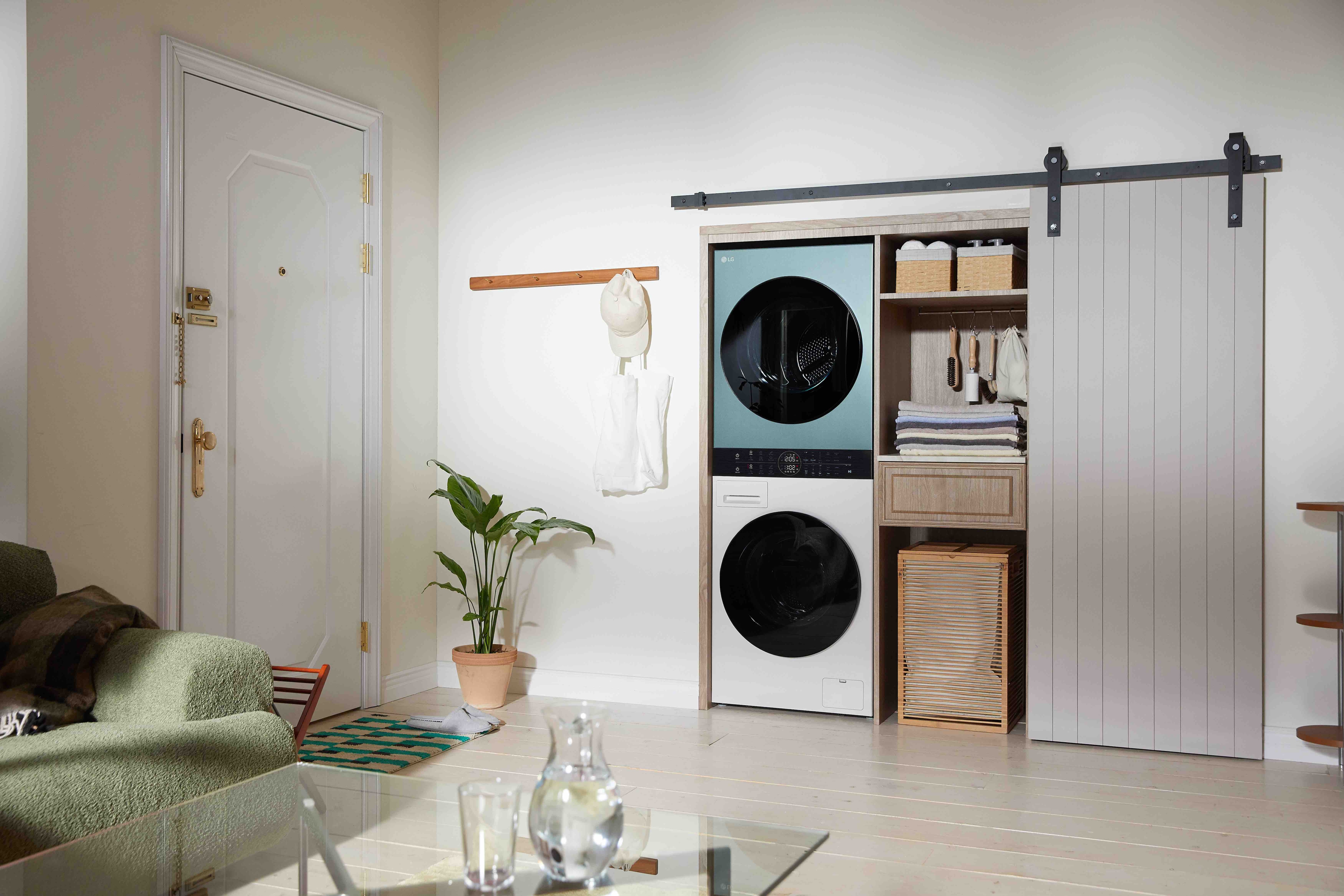 It shows compact LG WashTower placed in the small utility room.