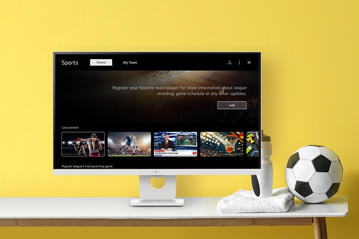 The LG Smart Monitor screen is showing live sports channels.