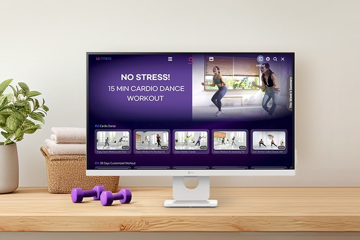 The LG Smart Monitor screen is showing various LG Fitness videos.