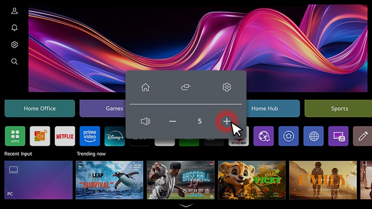 The LG Smart Monitor screen shows the webOS interface, and the volume is being turned up.