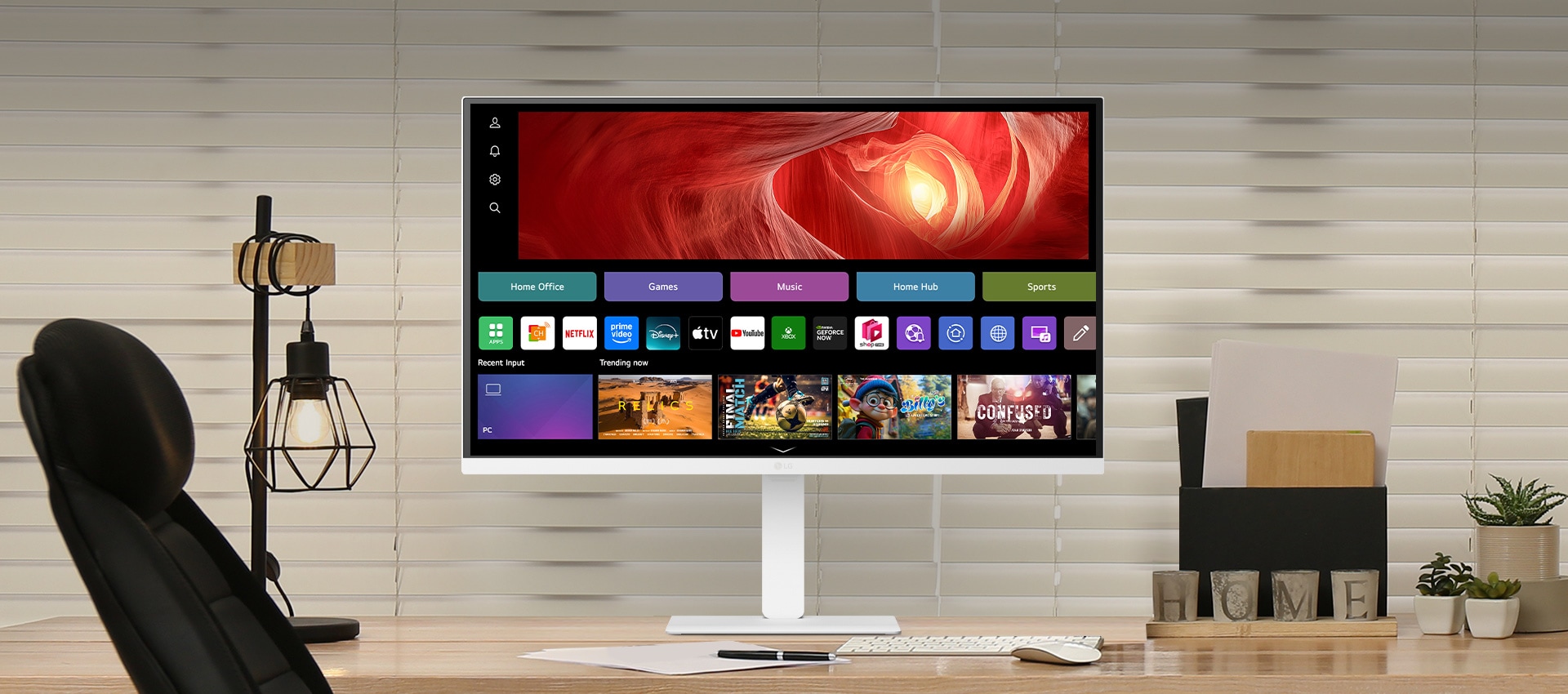 Desk setup with LG Smart Monitor for work and play.