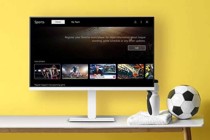 The LG Smart Monitor screen is showing live sports channels.	