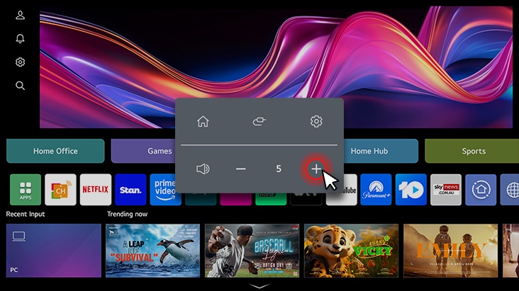The LG Smart Monitor screen shows the webOS interface, and the volume is being turned up.