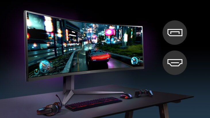 The monitor is connected to a console game player and a laptop, and displays each screen on a screen simultaneously.