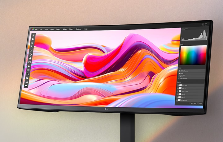 An ultra-wide LG monitor displaying vibrant aurora imagery with a photo editing interface, showcasing vivid colour accuracy and high-resolution detail.