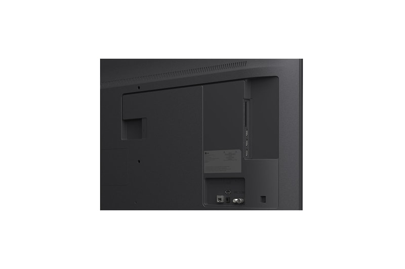 LG TV with an impressively large screen mounted on a wall above a LG Soundbar in a modern style living room.