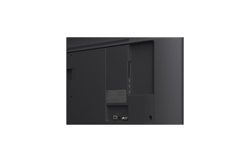 LG TV with an impressively large screen mounted on a wall above a LG Soundbar in a modern style living room.