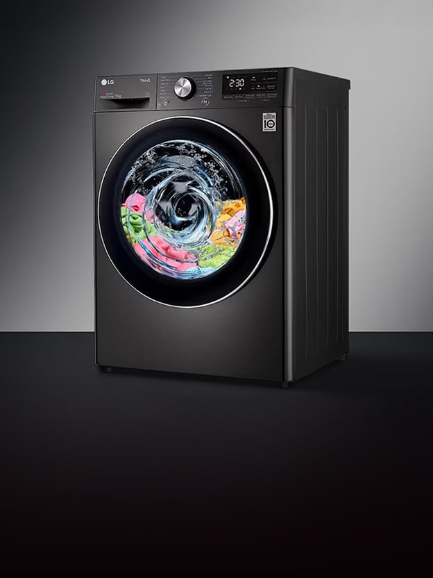 Een zwarte LG-Lave-linge met voorlader is in werking, met gekleurde was zichtbaar binnenin.