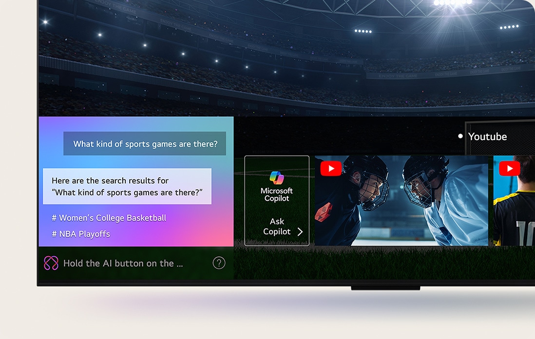 Um close da tela da LG QNED TV mostrando como o AI Search funciona. Uma pequena janela de bate-papo está aberta, mostrando como o usuário perguntou quais partidas esportivas estão disponíveis. O AI Search responde por bate-papo, mostrando miniaturas dos conteúdos disponíveis. Há também um prompt para perguntar ao Microsoft Copilot. 