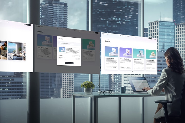 Esta imagem captura uma cena de um administrador gerenciando uma solução em um laptop, com várias páginas do site da solução aparecendo acima.