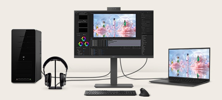 Front view showing a workstation with multiple devices connected to monitors.	