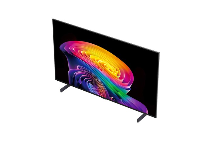 A LG OLED evo AI C6, para uma experiência de jogo imbatível em 4K a 165Hz, exibe um jogo de corrida em alta velocidade com um carro amarelo de fórmula em movimento, a palavra "WIN" em negrito na tela e os logotipos NVIDIA G-SYNC e AMD FreeSync Premium na parte superior.