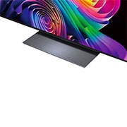 A LG OLED evo AI C6, para uma experiência de jogo imbatível em 4K a 165Hz, exibe um jogo de corrida em alta velocidade com um carro amarelo de fórmula em movimento, a palavra "WIN" em negrito na tela e os logotipos NVIDIA G-SYNC e AMD FreeSync Premium na parte superior.