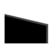 A LG OLED evo AI C6 está instalada na parede de uma sala de estar elegante, apresentando um design ultrafino com bordas estreitas, e exibe na tela uma paisagem urbana à beira do rio ao pôr do sol.