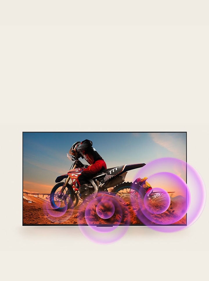 A LG QNED TV mostra um homem em uma motocicleta com círculos abstratos roxos saindo da roda, simulando ondas sonoras.
