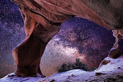 Perspective from a cave interior, looking out towards the entrance. The cave is surreal-looking with highly detailed rock and crystal formations. The scene highlights the impressive AI picture enhancement capabilities of LG TVs.