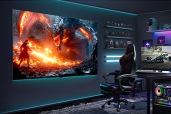 Game room with a wireless gaming setup. LG True Wireless TV is wall-mounted with a high-resolution game on its screen. PC, gaming chair, toys, and neon mood lights are also visible. Nvidia G-Sync logo and 144Hz logo are seen. 