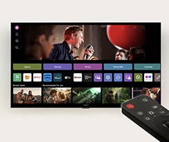 LG webOS interface with the AI Magic Remote in the foreground. The thumbnails on the user interface show personalized content recommendations from AI Voice ID.