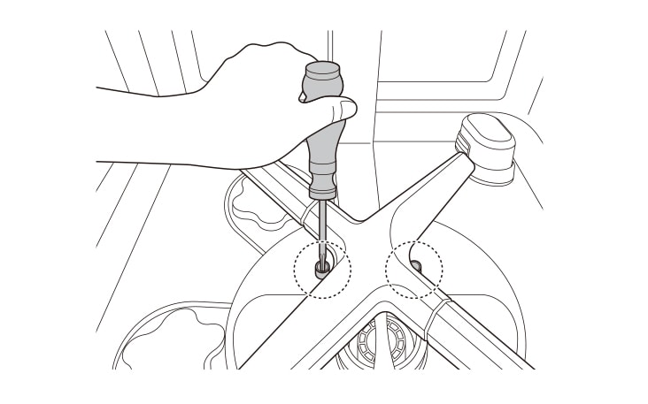 Using a screwdriver, remove two screws assembled to the lower nozzle.