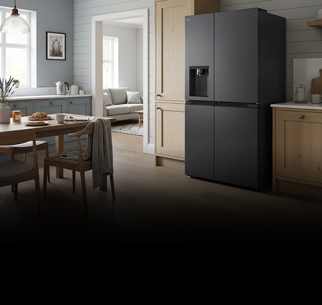 A black side-by-side refrigerator with a built-in water dispenser in a modern kitchen.