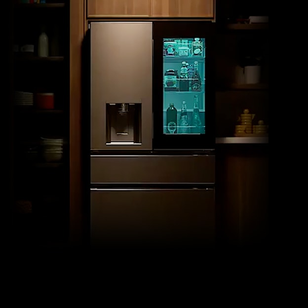 LG refrigerator installed in a kitchen with a lit door panel display illustrates MyColor, which lets the door panel color match the space and mood.