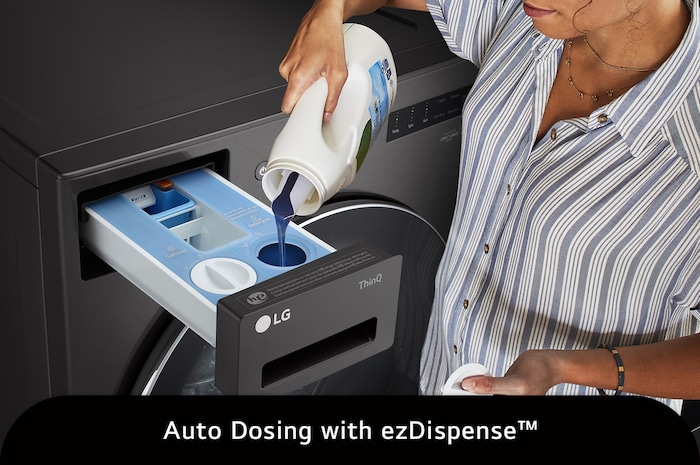 The LG Front Load Washer WM6700HBA in Black Steel, illustrating a user refilling the ezDispense™ Auto Dosing System, emphasizing the convenience of automatic detergent and softener dispensing.