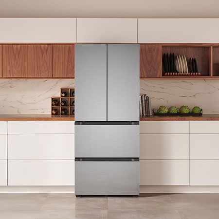 The stainless steel finish LG 30-inch 13.9 cu.ft. Kimchi Refrigerator LK14S8000V, shown installed in a modern kitchen.