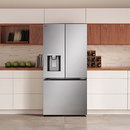 The PrintProof™ Stainless Steel LG 33-inch 20 cu.ft. Counter Depth French Door Refrigerator LF20C6330S with ice & water dispenser, in a modern kitchen.
