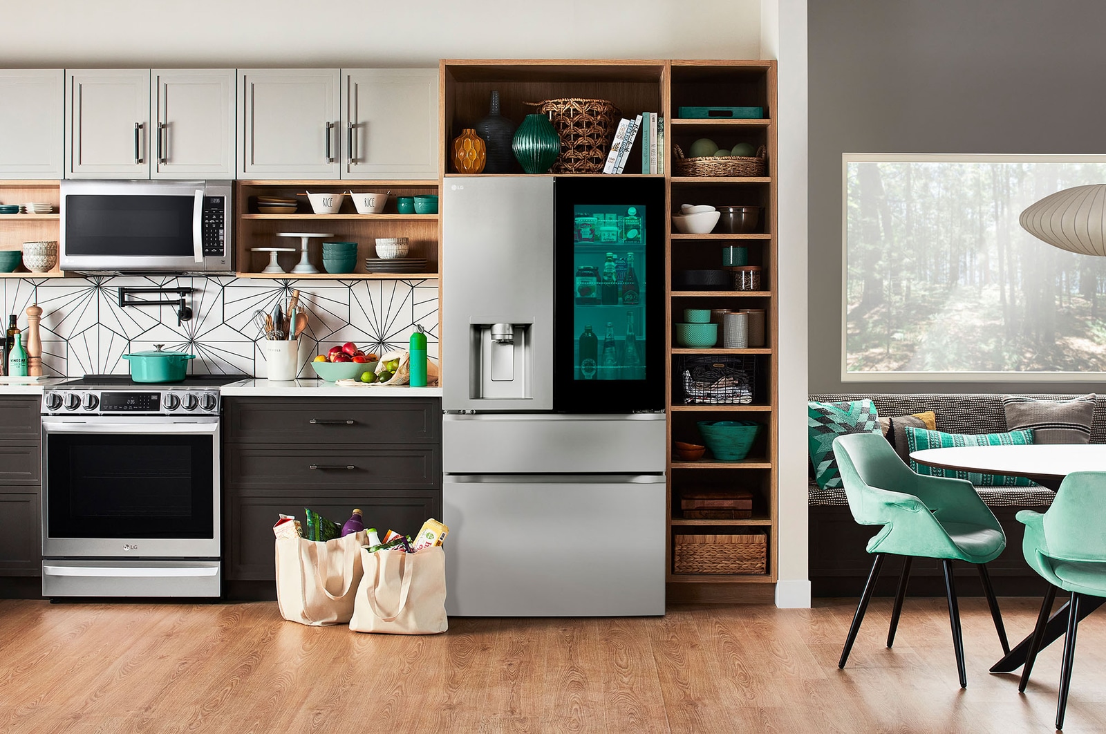 The PrintProof™ Stainless Steel LG 36-inch 29 cu.ft. French Door Refrigerator LF29S8365S with illuminated InstaView® window, in a modern kitchen.