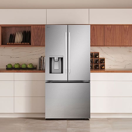 The PrintProof™ Stainless Steel LG 33-inch 25 cu.ft. French Door Refrigerator LF25H6330S with ice & water dispenser, shown in a modern kitchen.