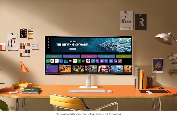 The LG Smart Monitor 34U601SA in White displays the webOS Home Hub in a stylish desk setup, ideal for productivity and entertainment.