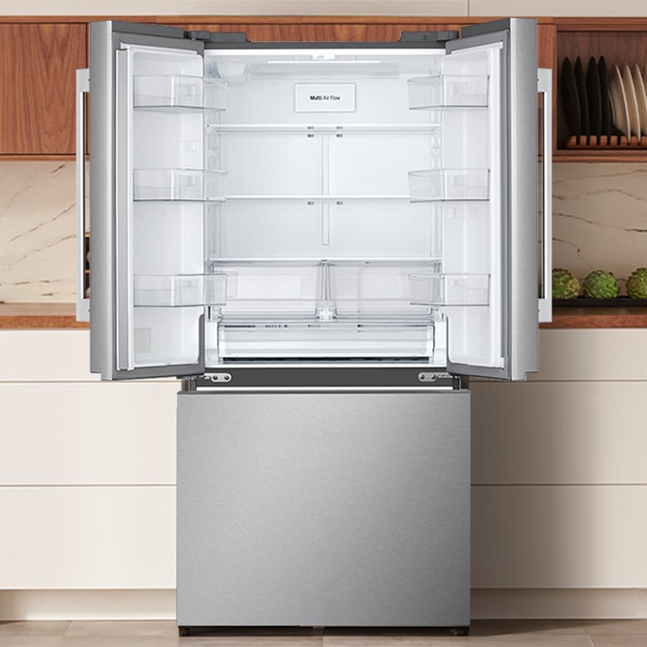 Open stainless steel French door refrigerator stocked with fresh food and drinks in a modern kitchen.