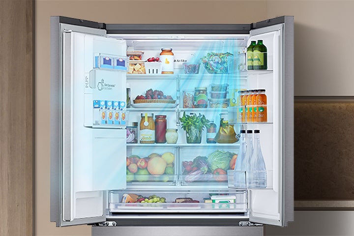 Open stainless steel French door refrigerator filled with fresh produce and drinks, showing blue airflow cooling lines.