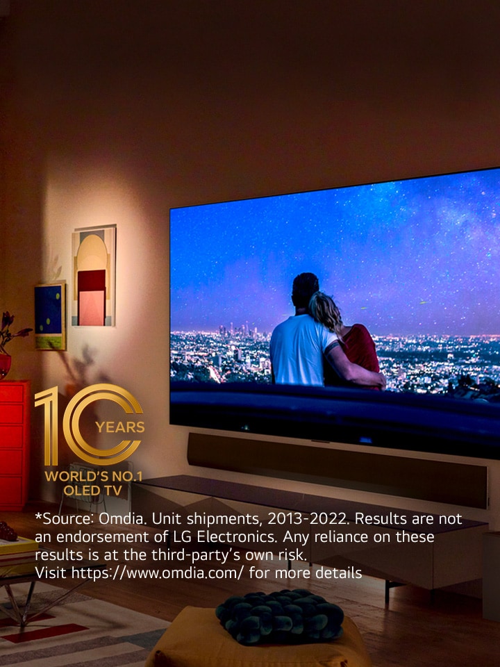 An image of LG OLED evo G3 on the wall of a modern and quirky New York City apartment with a romantic night scene playing on the screen.  10 Year World's No.1 OLED TV emblem.