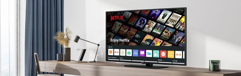 The hotel content including Netflix App is shown on TV inside the hotel room.