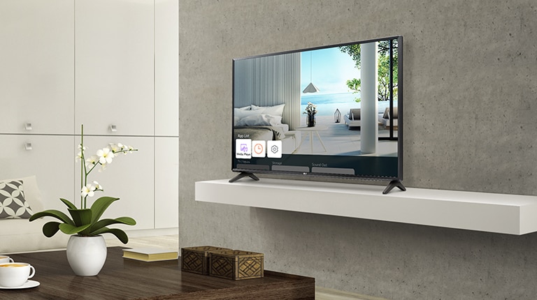 A TV is placed on the hotel’s wall and various menu items such as an app list are displayed on its screen.