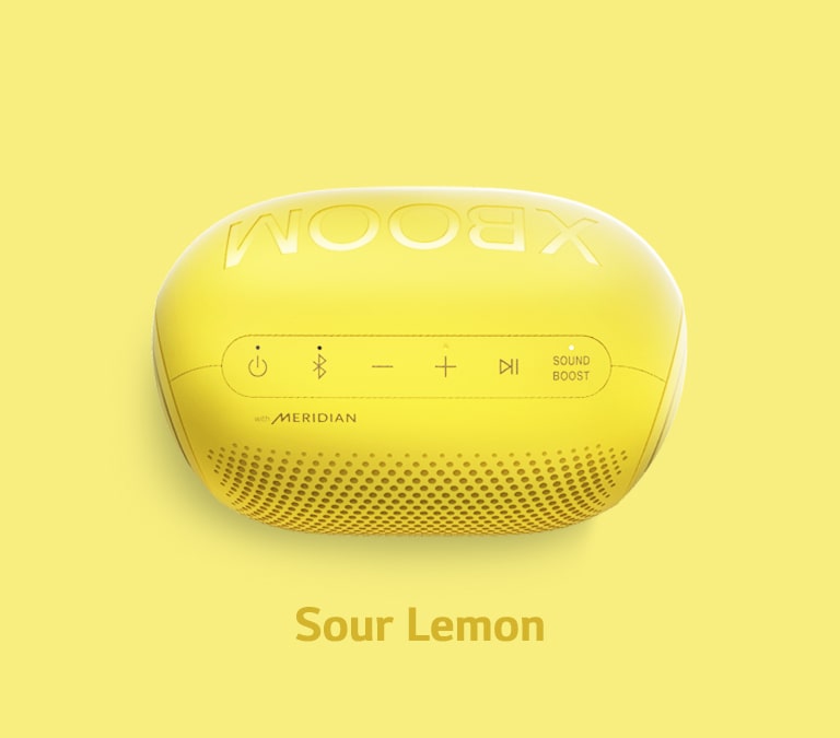A sour lemon flavored Jellybean of LG XBOOM Go is placed on a yellow background.