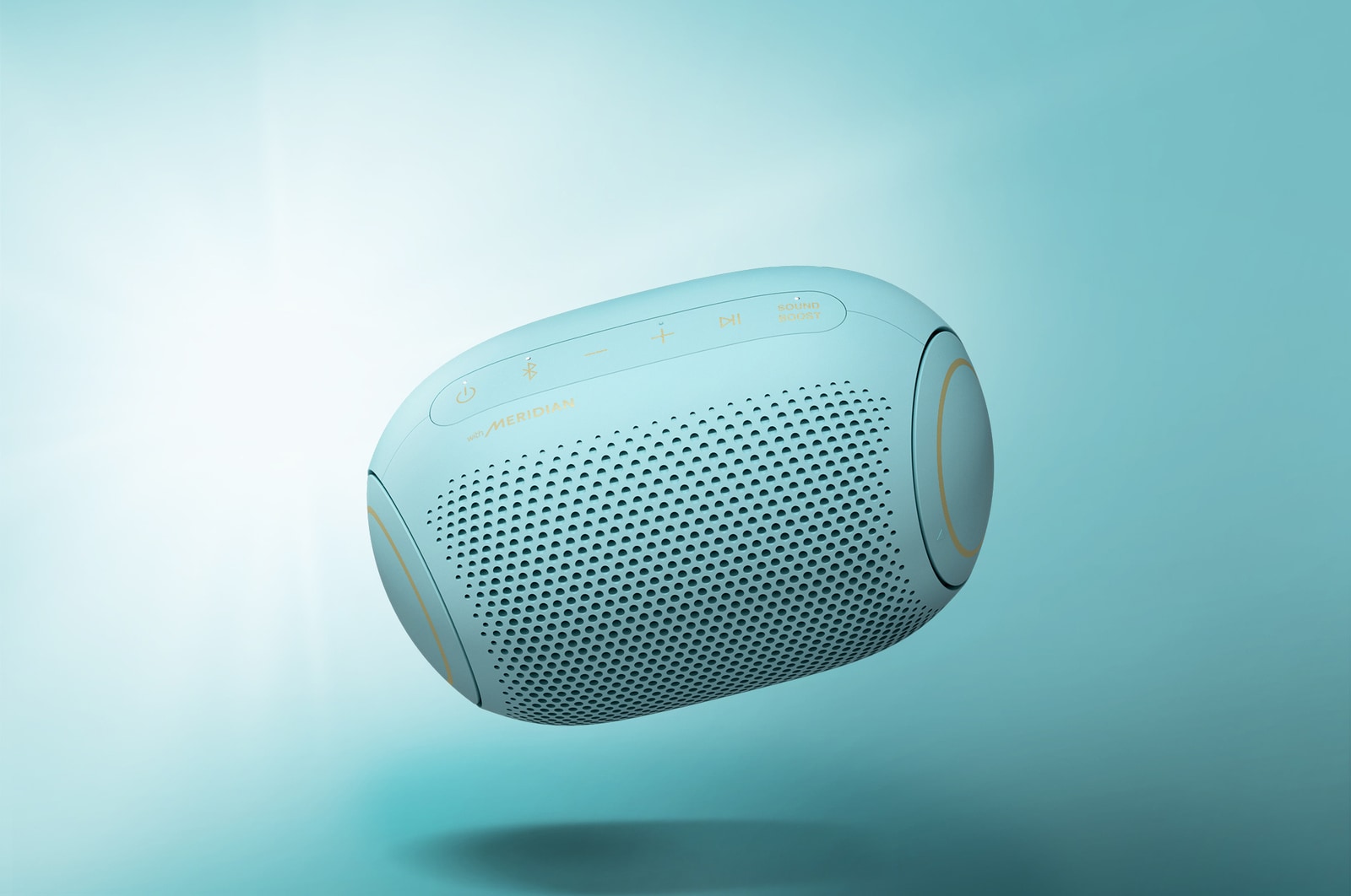 A front view of an LG XBOOM Go tilting down to its left and floating in the air
