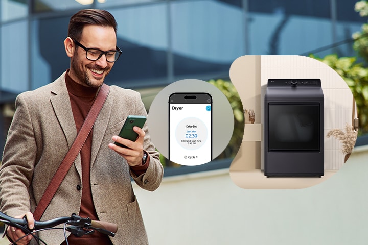 A man using a smartphone app to remotely control a black LG smart dryer with a delay start setting.