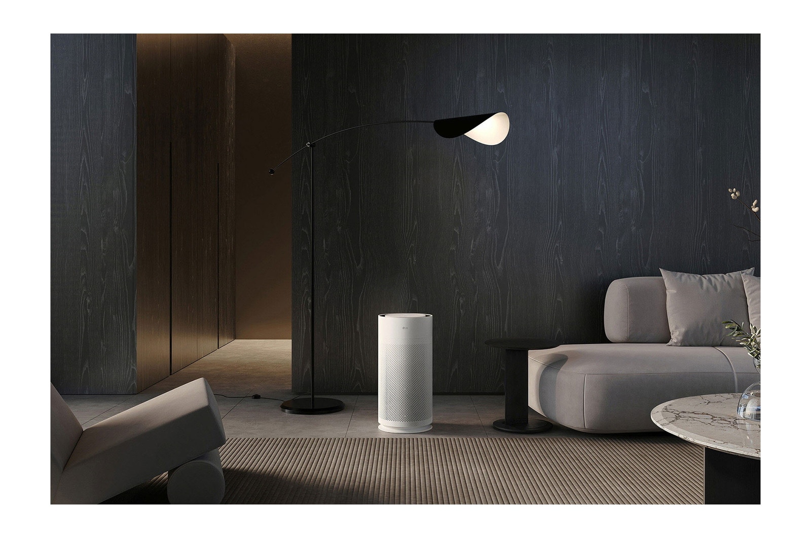 LG air purifier placed in a stylish living room and modern décor
