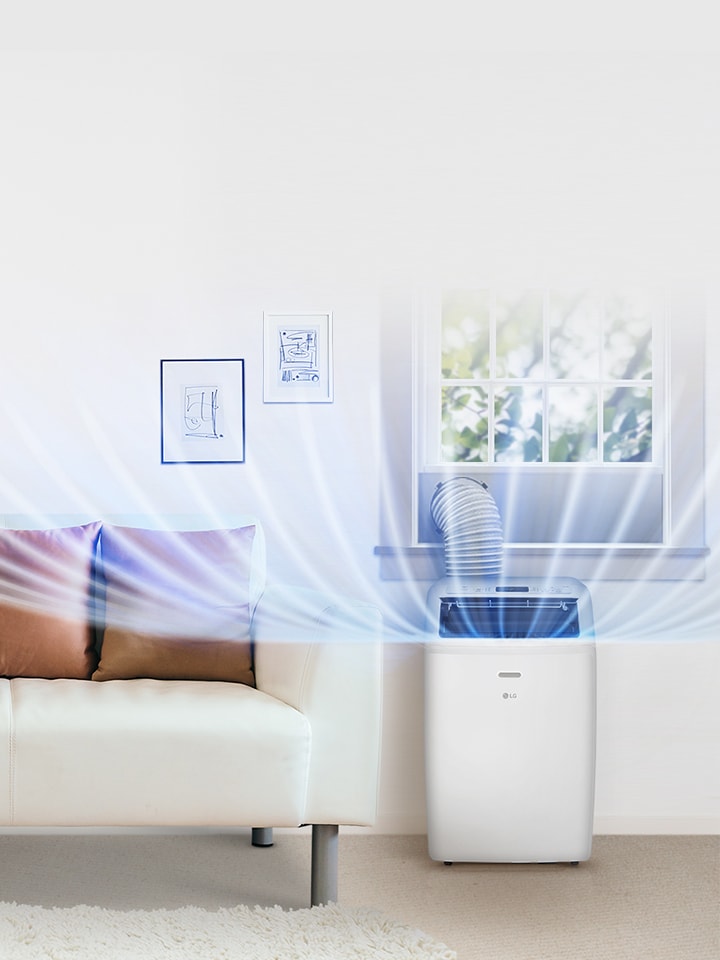 LG portable air conditioner cooling a living room with a sofa and plant, showcasing powerful and advanced cooling.