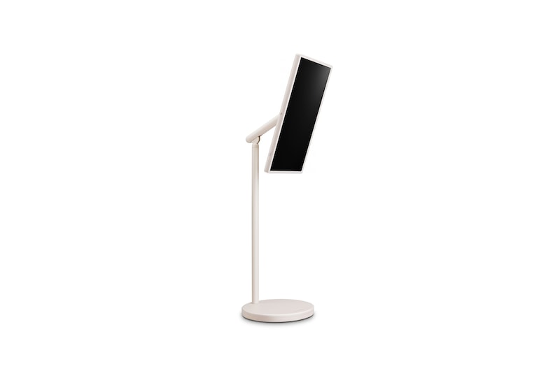 45 degree side view of the LG StanbyME 2 on stand. Screen is tilted to show its flexible orientation. 
