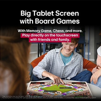 A group of friends playing a board game on the LG StanbyME 2 on the table. The Big Tablet Screen is featured. Text talks about playing directly on the touchscreen.