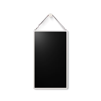 LG StanbyME 2 is hung on the wall using the wall strap.