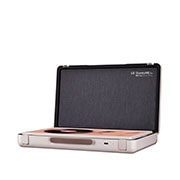 45 degree side view of table mode that shows a coral turntable music skin