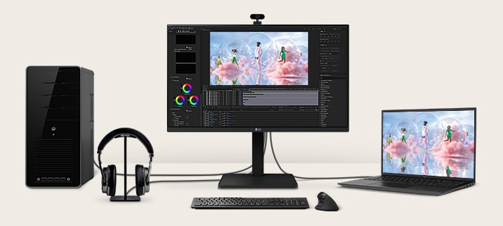 Front view showing a workstation with multiple devices connected to monitors.