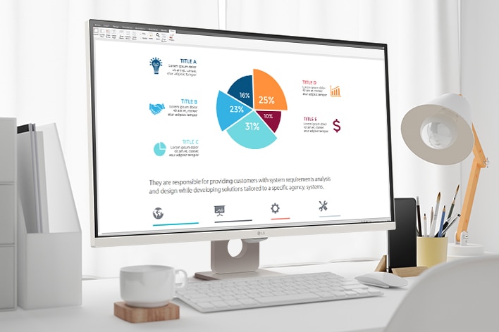 On the table, there is a smart monitor, displaying a home office document being worked on. To the left of the monitor, there is a cup with a handle, and to the right, there is a mobile phone, a pencil holder, and a stand.