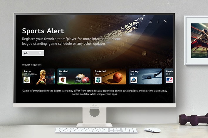 The smart monitor screen placed on the table displays the SPORTS APP screen.